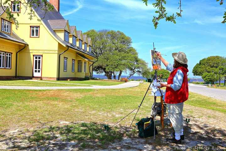Anne painting on the grounds of the Whalehead Club